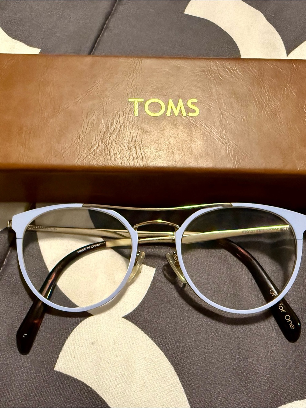 Tom’s Carmella Frames in Baby Blue with Gold Metal Temples